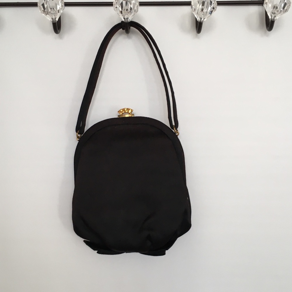 Black vintage satin clasp handbag